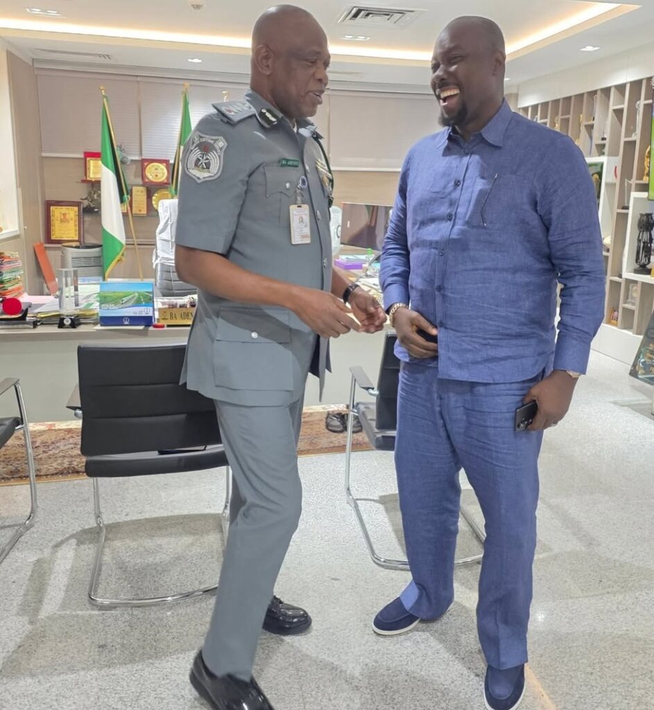 Obi Cubana shaking hands with the Controller General of the Nigeria Customs Service Bashir Adewale Adeniyi.